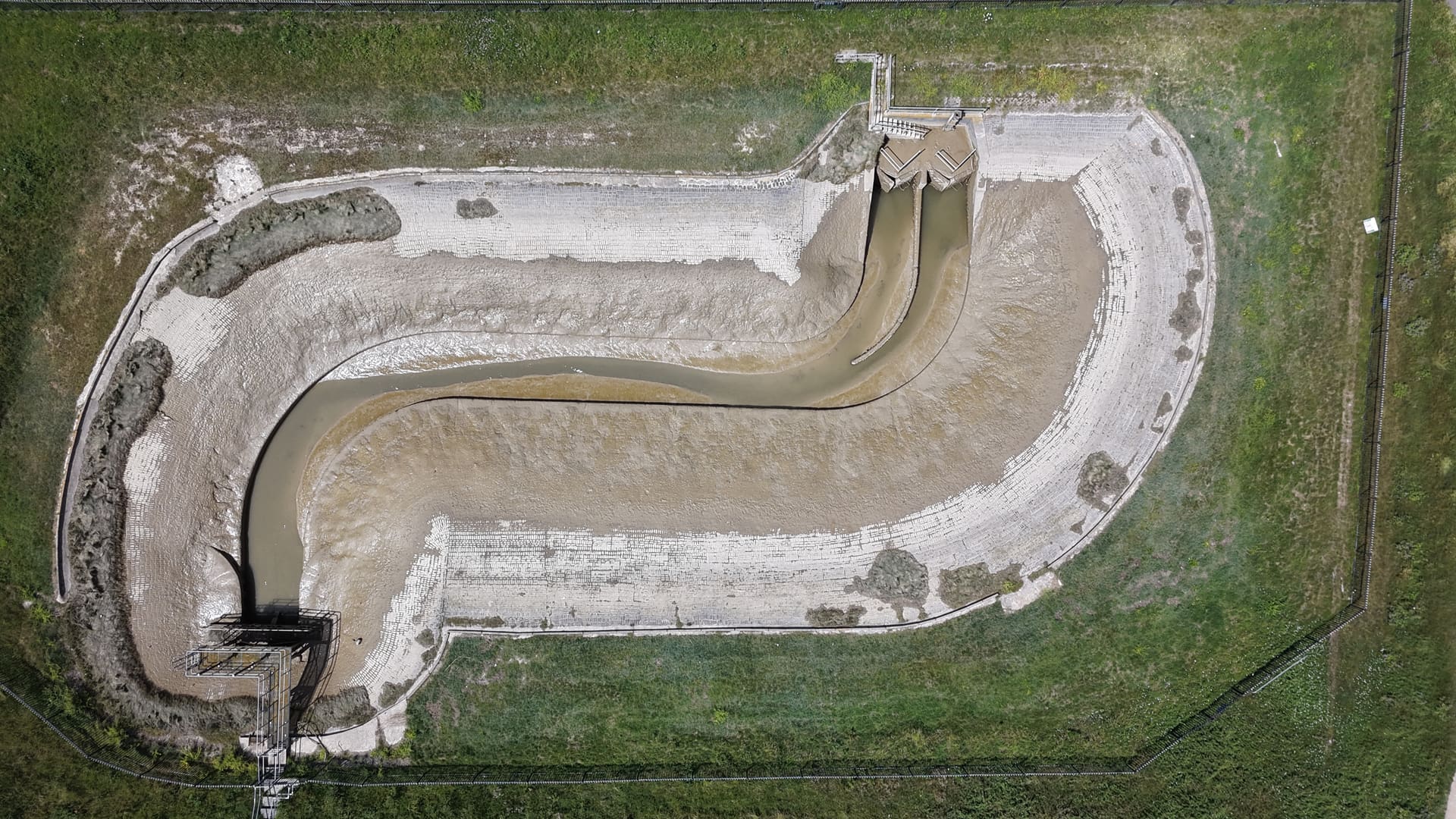 A drainage structure, shot straight down from above.